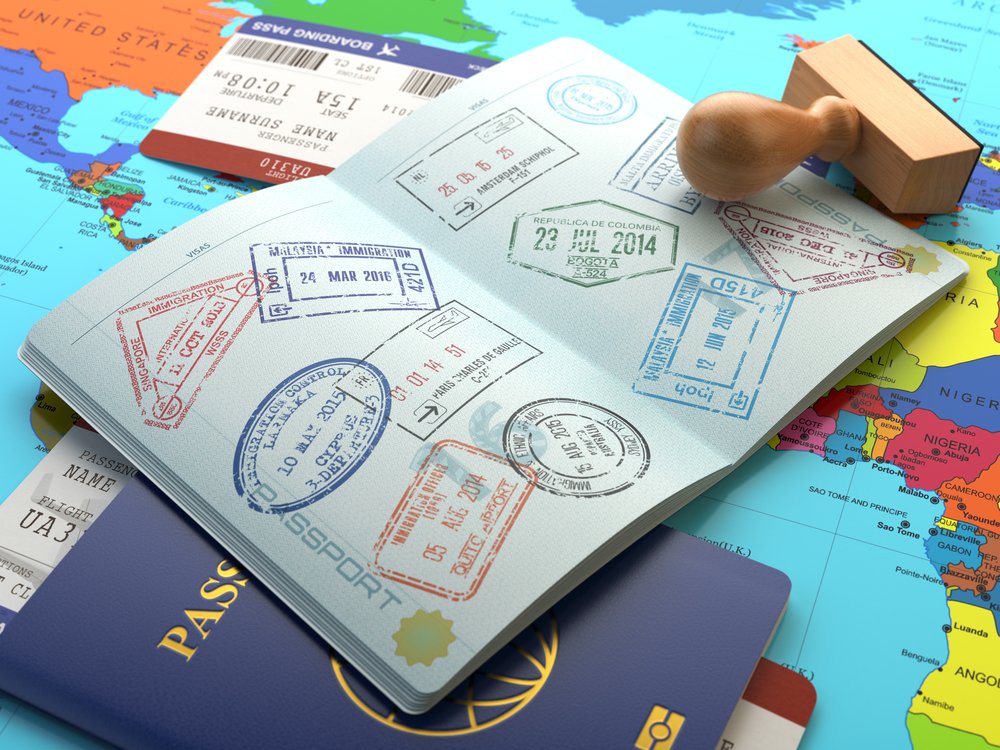 Travellers passing through an airport terminal